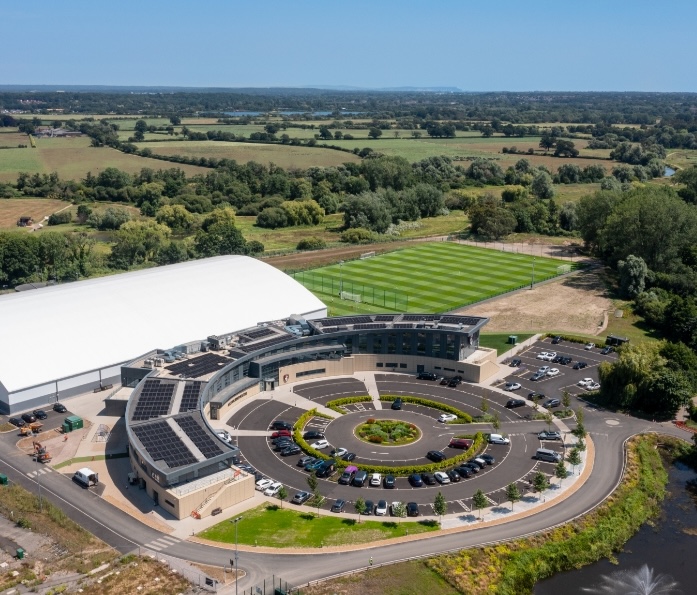 Aerial view of AFC Bournemouth's training centre with Utilita solar panels installed, supporting renewable energy generation.